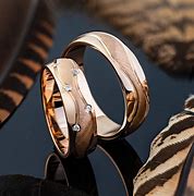Image result for Brown and Rose Gold Wedding Rings