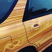 Image result for Wood Grain Vinyl Wrap On Black Chevy Truck