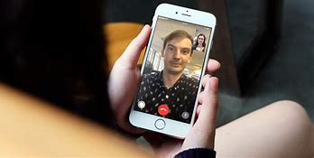 Image result for Image of a FaceTime Screen Shot Talking to Somone Wearing Sunglasses