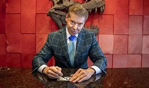 Image result for Vince McMahon in His Office
