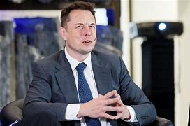 Image result for Images of Elon Musk Sitting Down