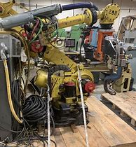 Image result for Fanuc Robot CNC Machine