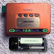 Image result for Sony Walkman CD Player Orange