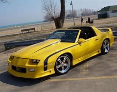 Image result for Camaro Yellow with Black Strapes