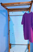 Image result for Fold Away Wall Mounted Clothes Drying Rack