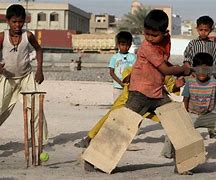 Image result for Barefoot Indian Kids Playing Cricket