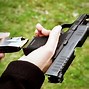 Image result for Guy Loading Gun