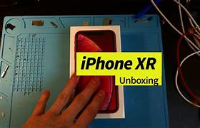 Image result for Photos of iPhone SE 2 Red Unboxing