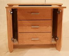 Image result for Hidden Compartment Back of Cabinet
