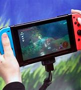 Image result for Playing Nintendo Switch