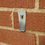 Image result for Brick Wall Sticky Hooks