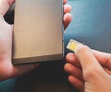 Image result for Sim Ejector Card In