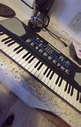 Image result for Techno Beat Electronic Keyboard