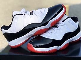 Image result for Jordan 11 Low Bred