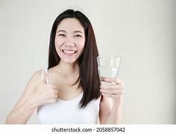Image result for Lady Holding Water Glass
