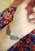 Image result for Angel Wings Wrist Tattoo
