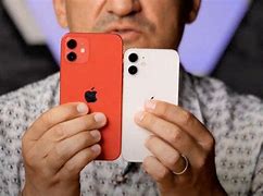 Image result for iPhone Mini in 7In Hand