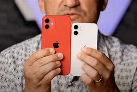 Image result for iPhone 12 Mini Compared to a 10 Years Olds Hand