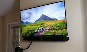 Image result for Wall Mounted TV with Sound Bar