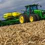 Image result for John Deere and Case Tractors
