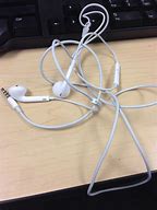 Image result for Tangled Apple Earbuds Meme