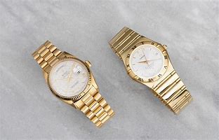 Image result for 24-Carat Pure Gold Watch