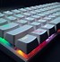 Image result for Pink Apple Laptop with Light Up Keyboard