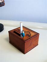 Image result for Timer Individual Cigarette Dispenser