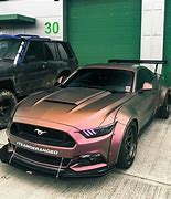 Image result for Matte Black with Gold Pearlescent Car