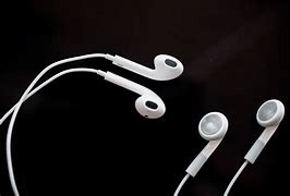 Image result for Wearing Apple EarPods