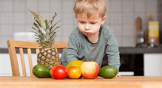 Image result for Toddler Holding Fruit