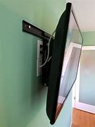 Image result for Hide Cable Box Behind TV