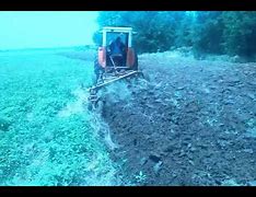 Image result for Case 900 Tractor Plowing