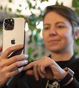 Image result for iPhone 13 Piclup in Hand