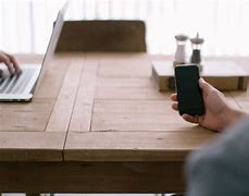 Image result for Person Placing Phone On Table