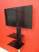 Image result for Corner TV Wall Mount with Shelf