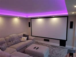 Image result for Living Room 2 Sofas Huge Projector Screen
