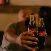 Image result for Coca Cola Bottle Opener