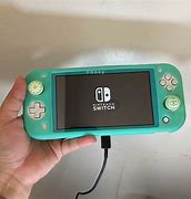 Image result for Nintendo Handheld Game Console