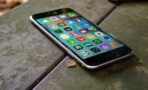 Image result for iPhone 11 On Wood Table