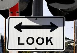 Image result for Look Here Sign