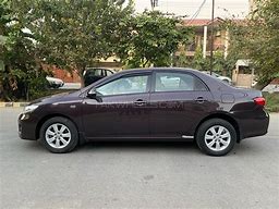 Image result for Toyota Corolla Gli Limited Edition Red