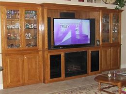 Image result for Oak Entertainment Centers Wall Units