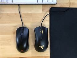 Image result for Ergonomic vs Ambidextrous Mouse