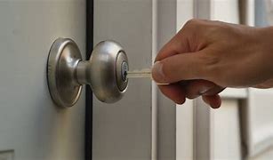 Image result for Man Unlocking Front Door