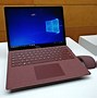 Image result for Surface Laptop Red
