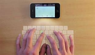 Image result for iPhone Laser Keyboard