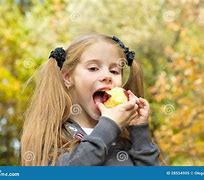 Image result for Little Girl Eating Apple Stock