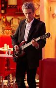 Image result for Doctor Who Peter Capaldi Guitar
