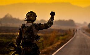 Image result for Picture of Soldier Holding Stop Sign